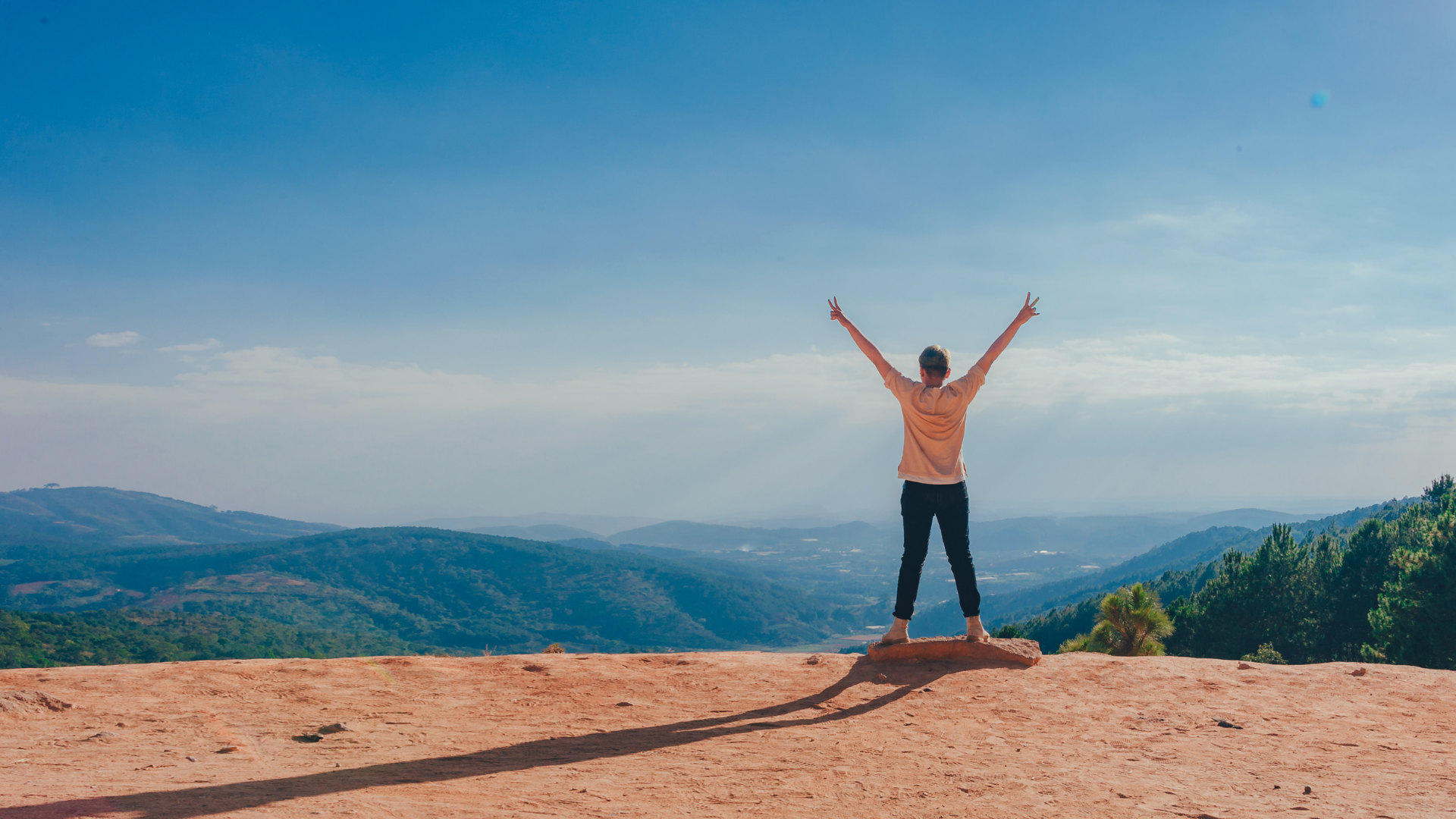 Man on top of mountain Man on top of mountain
